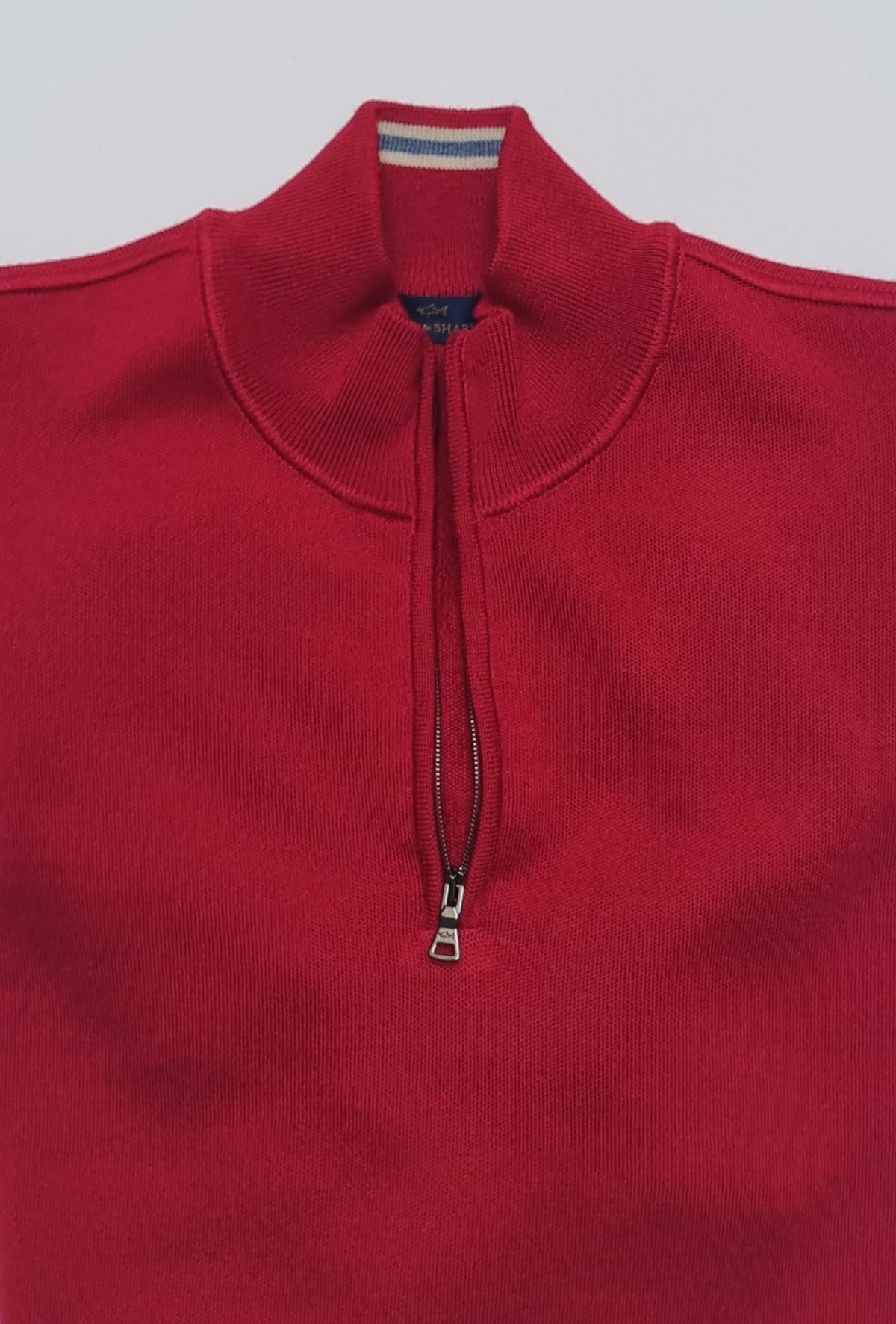 Stay warm in style with the Paul &amp;amp; Shark Wool Half Zip Jumper. Made from premium wool with an iconic badge, this versatile knitwear offers timeless comfort and sophistication for any occasion