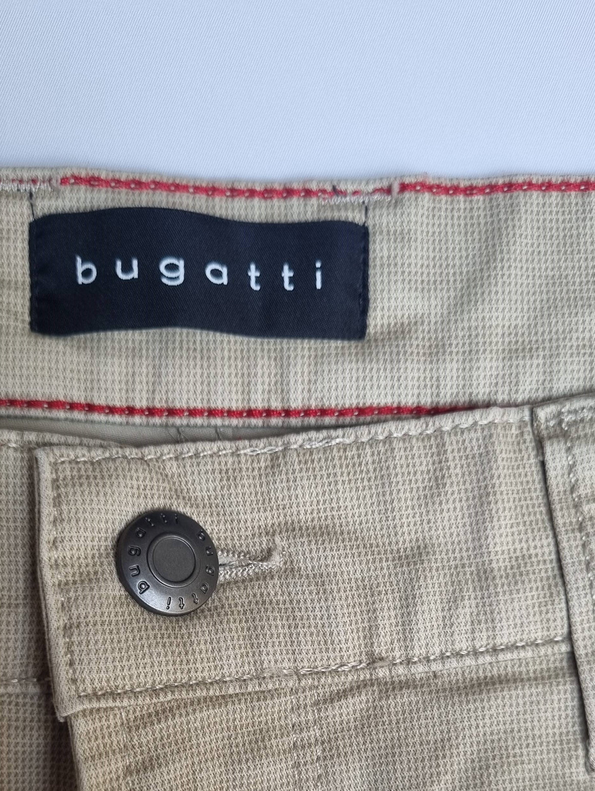 Close-up of a Bugatti label on a fabric background