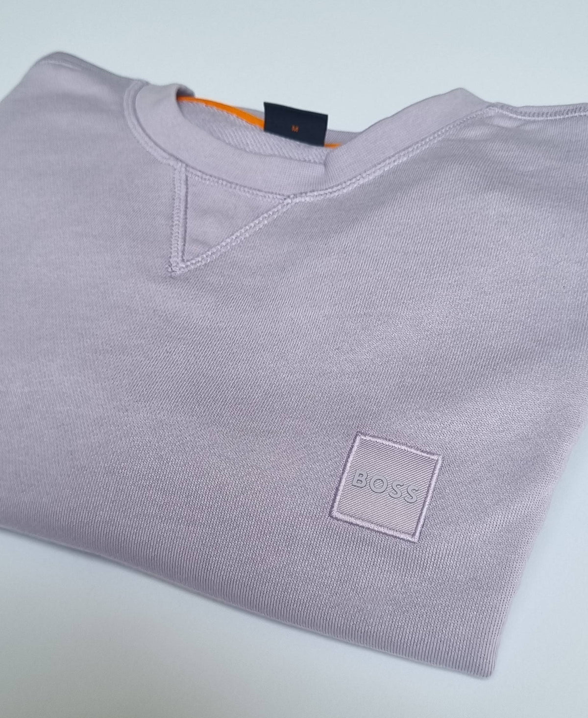 The Boss Orange Westart Sweatshirt brings sleek minimalism to your off-duty wardrobe.