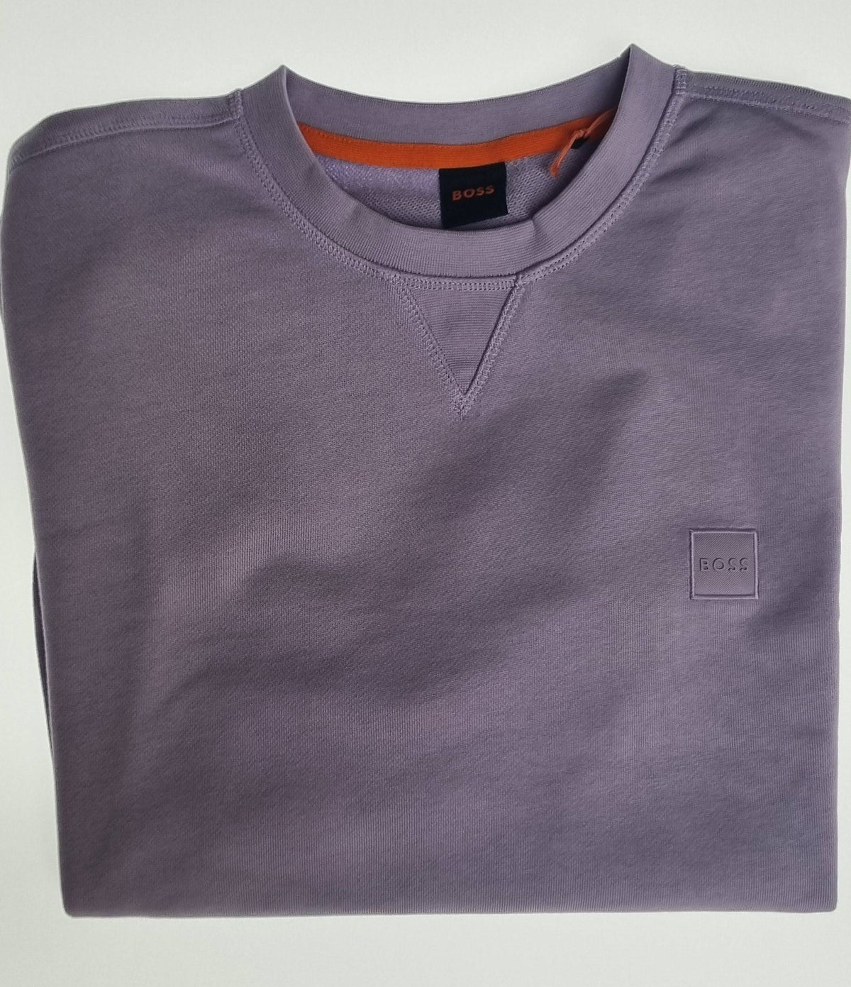 The Boss Orange Westart Sweatshirt brings sleek minimalism to your off-duty wardrobe.