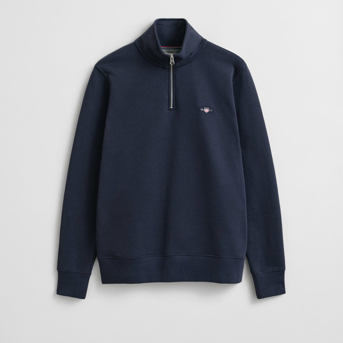 Navy blue sweatshirt with a small logo on 