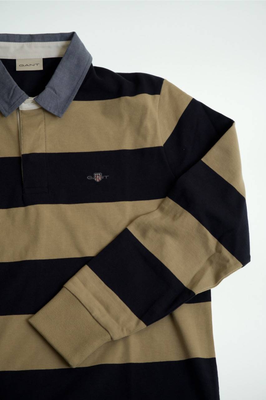 The GANT Chambray Stripe Heavy Rugger is a bold reinterpretation of the classic rugby shirt.
