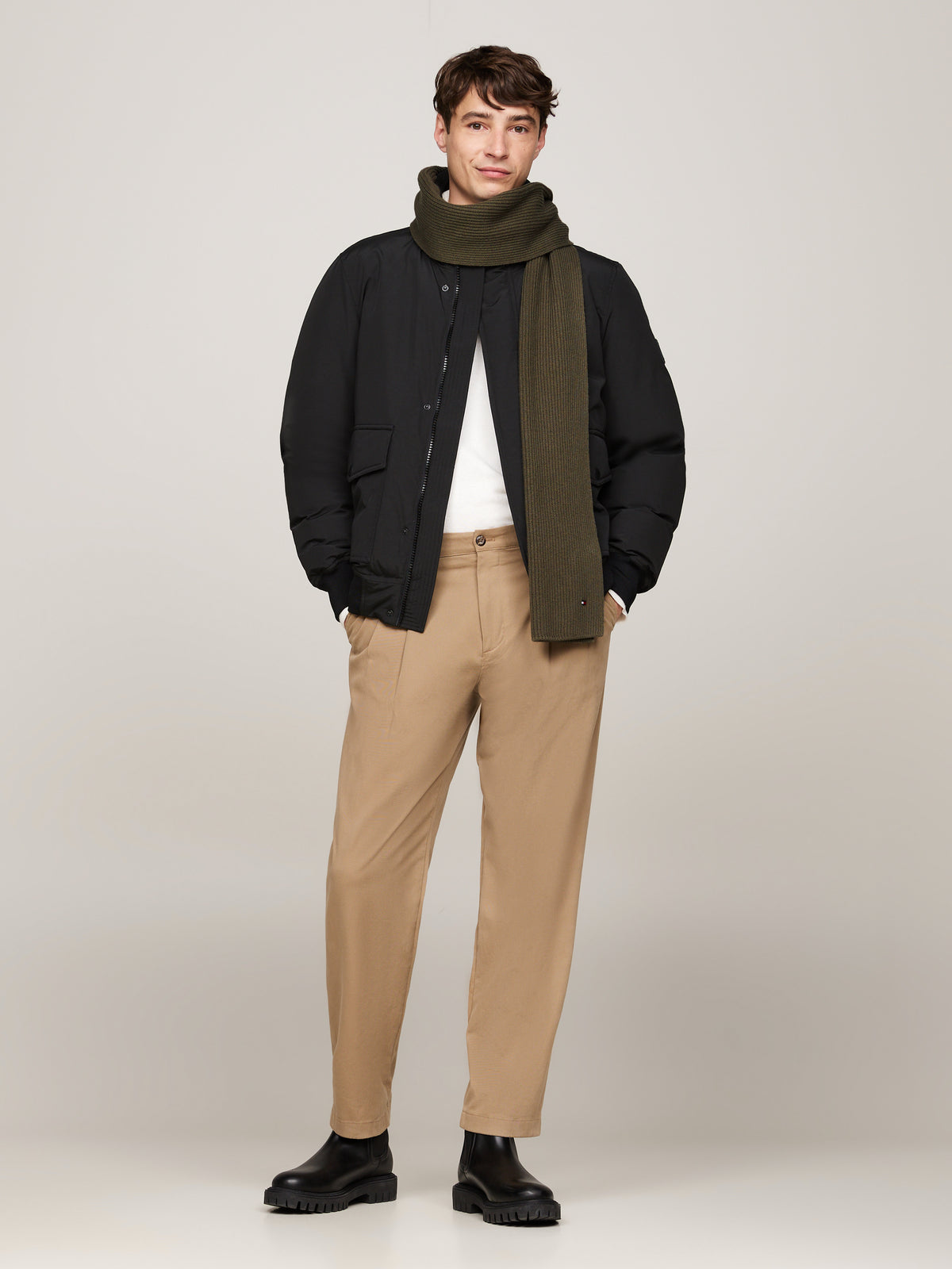 Elevate your winter wardrobe with the iconic Tommy Hilfiger Flag Pima Scarf.
