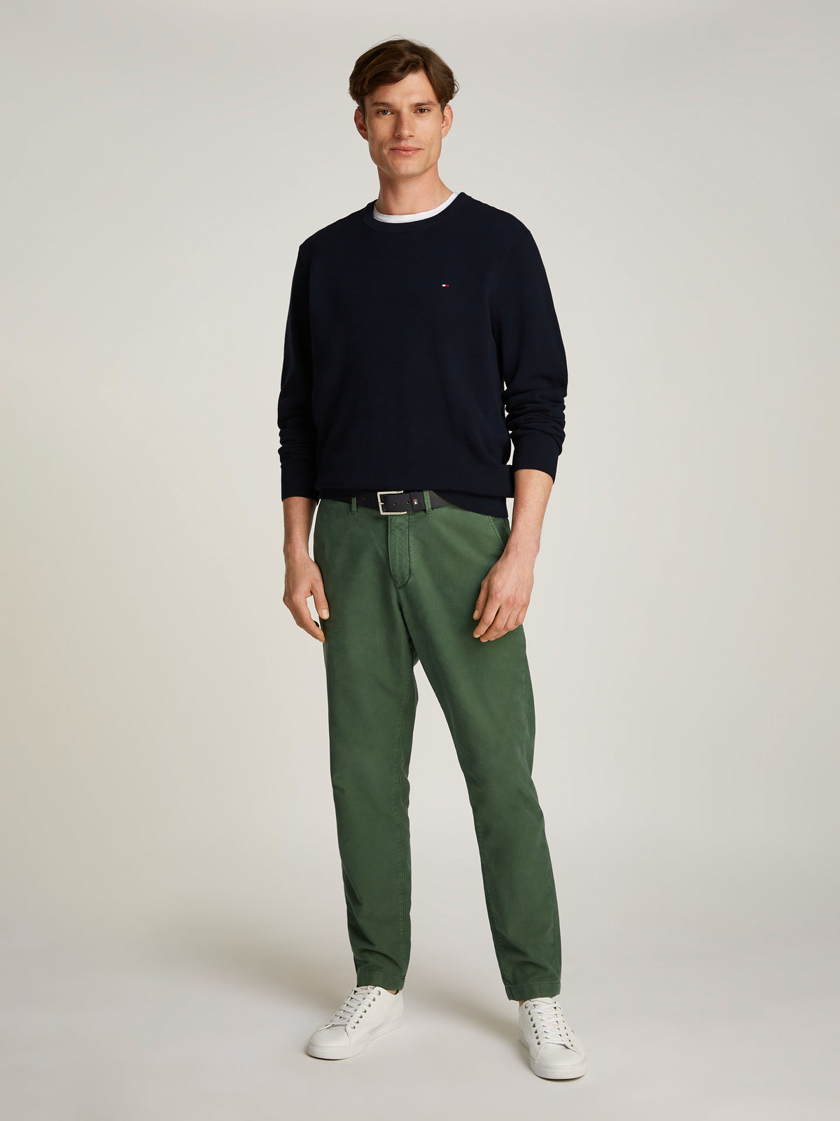 Tommy Hilfiger Herringbone Structure Crew Neck Jumper. Crafted from soft, premium fabric, this jumper features a sophisticated herringbone pattern that adds texture and depth to any casual or smart-casual outfit. 