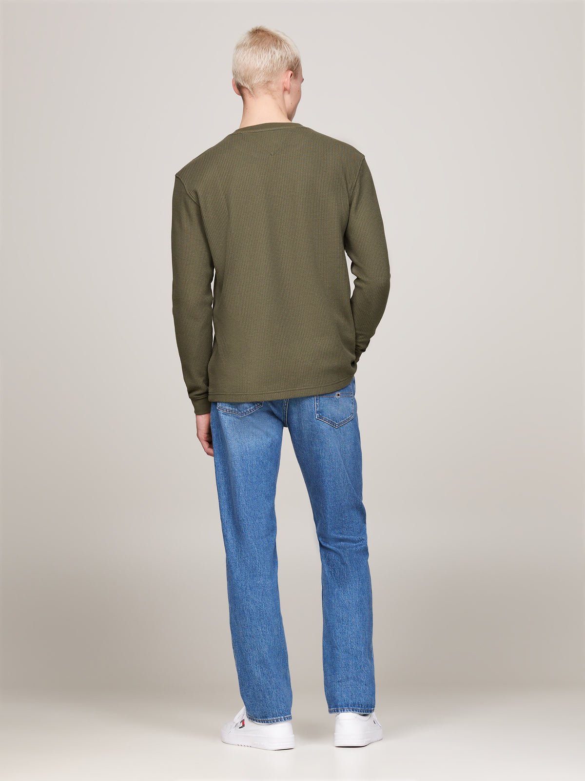Tommy Jeans Waffle Long Sleeve Tee. Featuring soft waffle-knit fabric and subtle branding, this long-sleeve top is perfect for casual outings or layering.