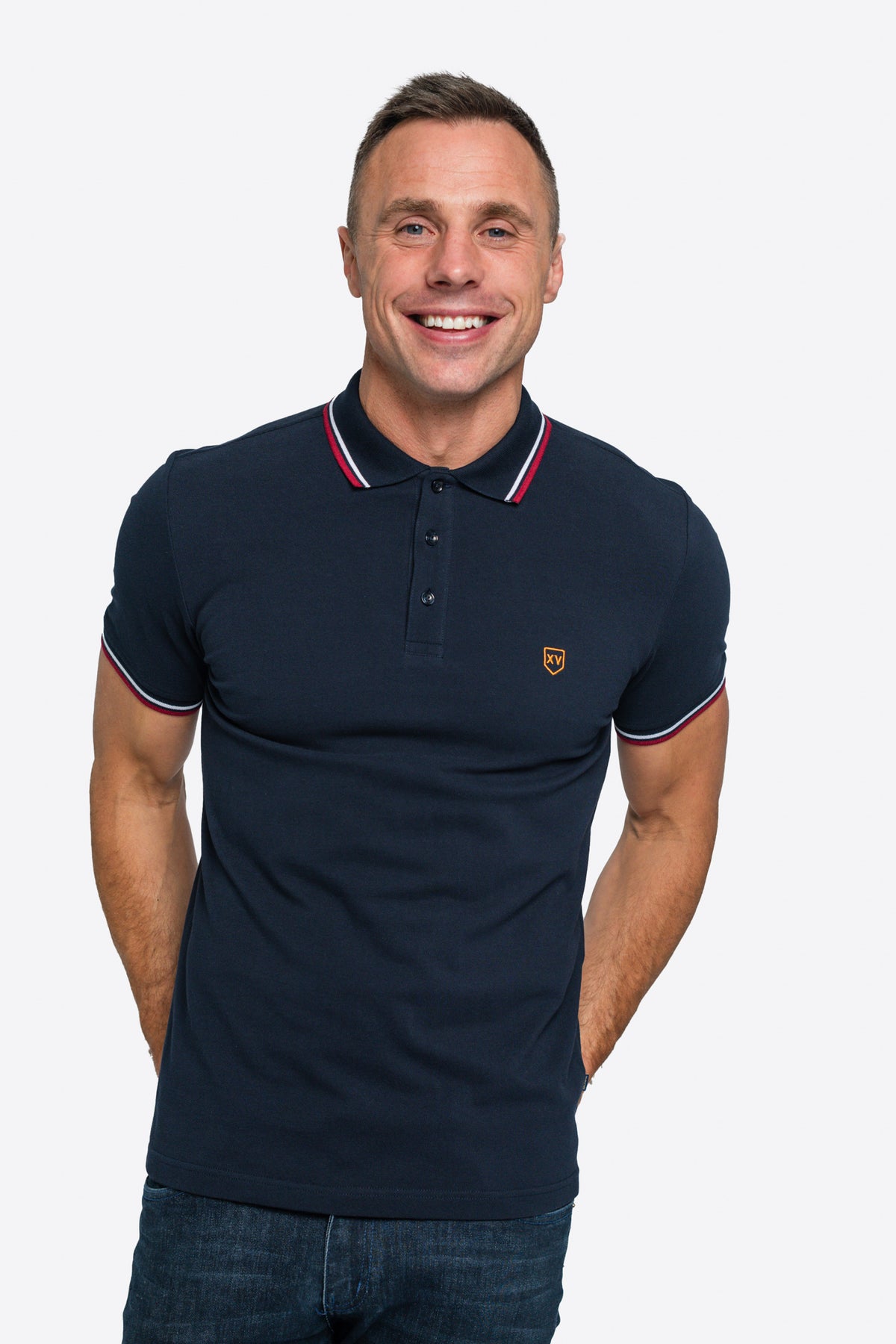 The XV Kings Ashborton Polo Shirt combines timeless style with modern comfort, making it an essential addition to your wardrobe. Made from high-quality fabric, this short sleeve polo shirt ensures breathability and ease of movement. With its sleek design and tailored fit, it’s perfect for casual outings or smart-casual occasions, offering a versatile look that transitions effortlessly.